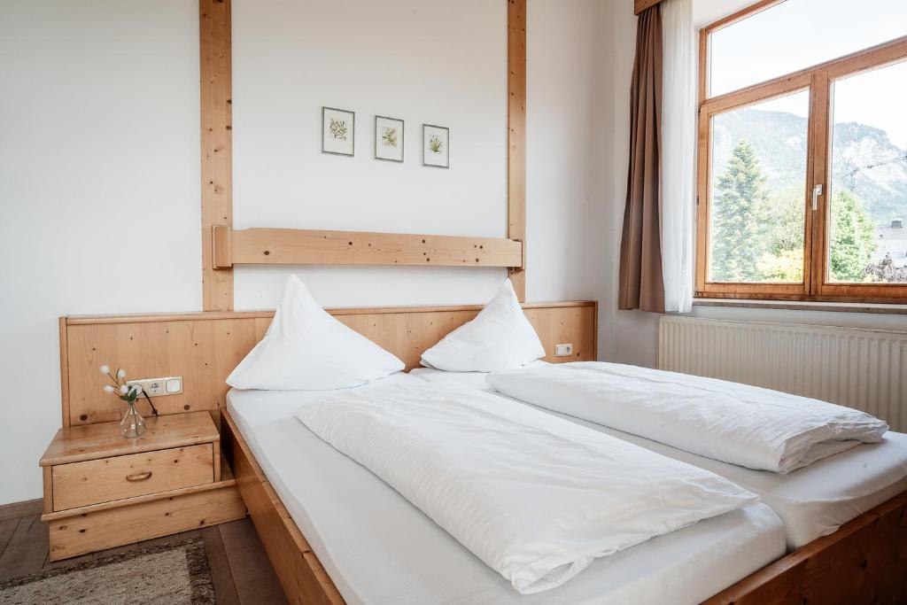 Postel nebo postele na pokoji v ubytování Hotel Vötterl