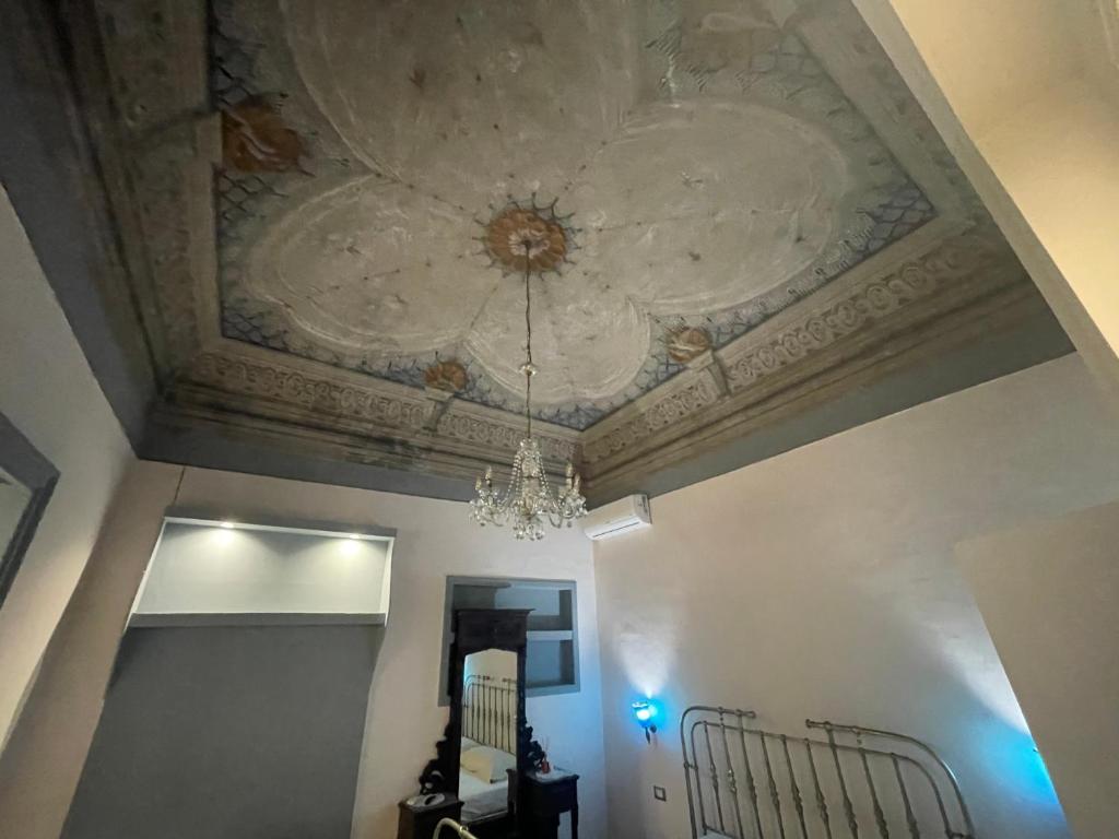 Łóżko lub łóżka w pokoju w obiekcie Belvedere Suite