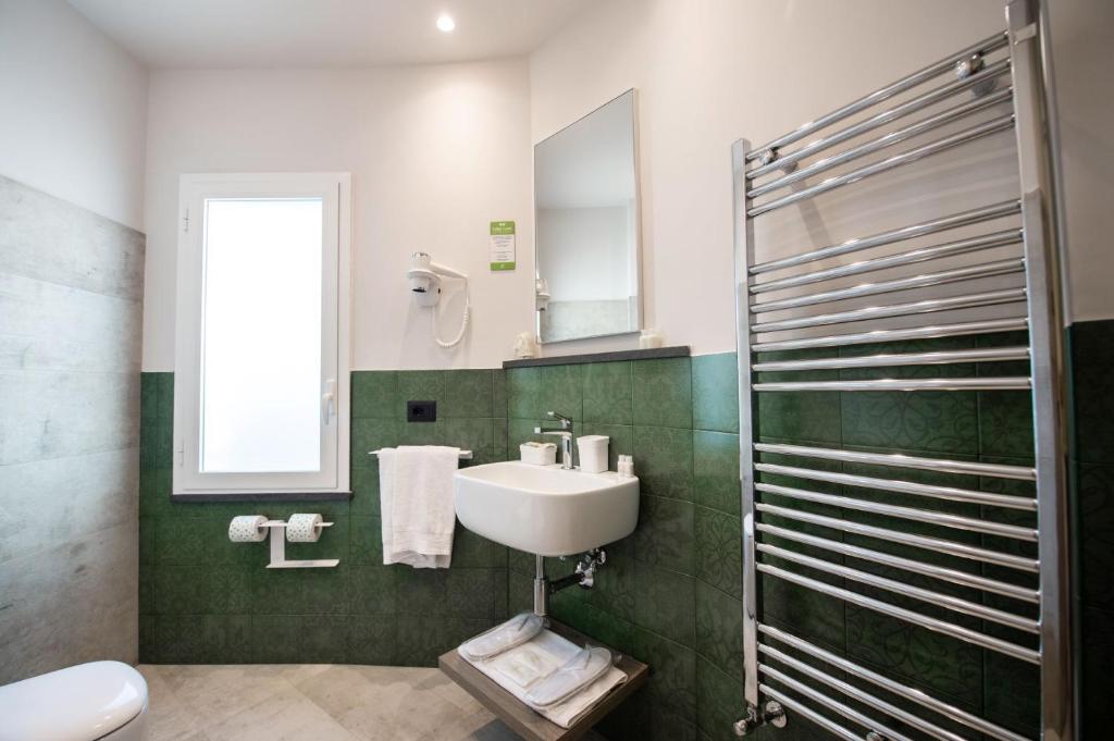 Kúpeľňa v ubytovaní Grand Hotel Faraglioni
