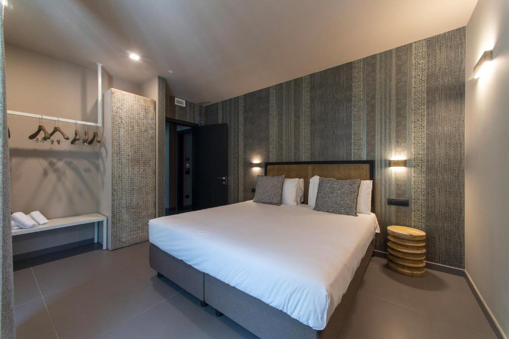 Łóżko lub łóżka w pokoju w obiekcie Gazzi Apartments 'Panoramic & Relaxing'