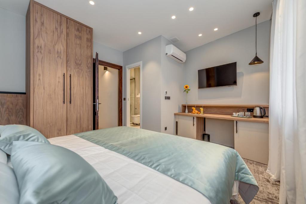 Posteľ alebo postele v izbe v ubytovaní Makarun Heritage Rooms