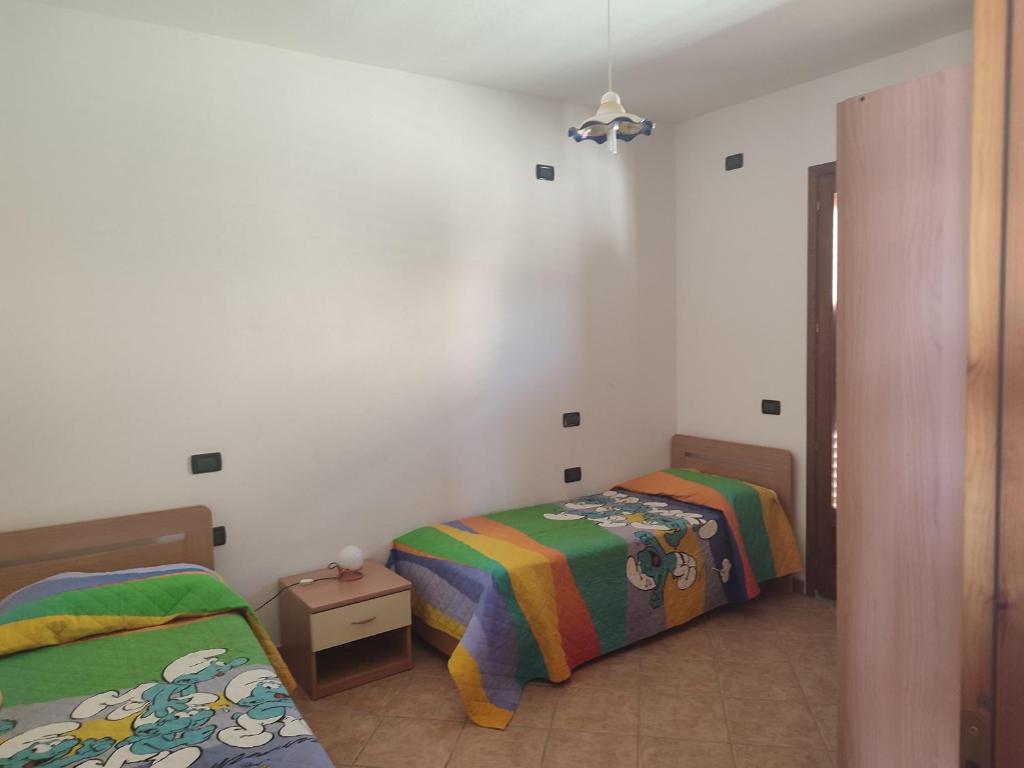 Vacanze Giorgia a La Caletta - Casa con Giardino sul Mare