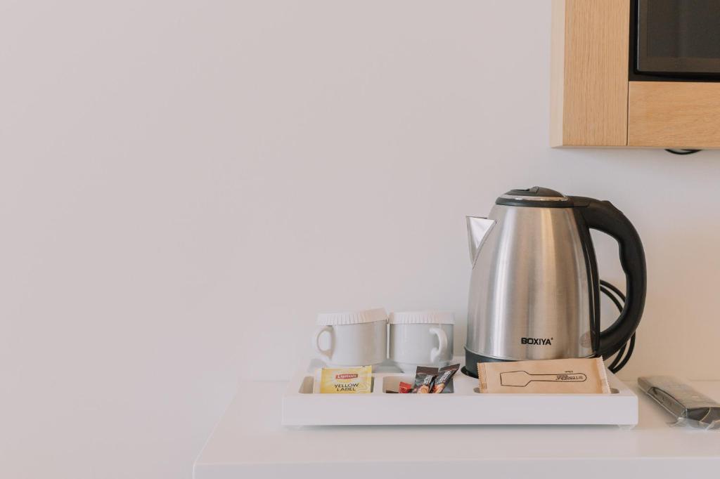 Příslušenství pro přípravu čaje a kávy v ubytování My Way Hotel & Events
