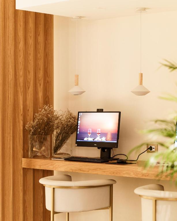 TV a/nebo společenská místnost v ubytování My Way Hotel & Events