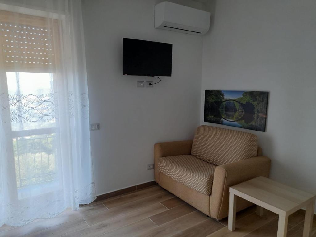 TV a/nebo společenská místnost v ubytování Cuore Verde del Cilento