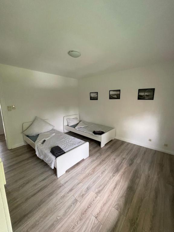 Postel nebo postele na pokoji v ubytování estrella24 LIVING ROOMS London