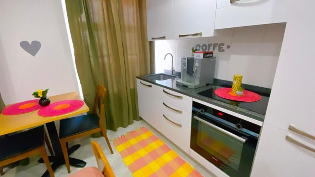 Kuchyň nebo kuchyňský kout v ubytování City Apartments Basel