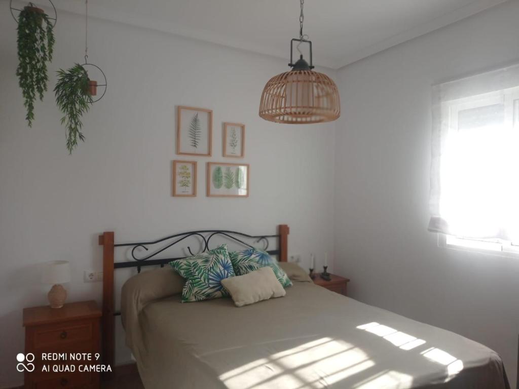 Postel nebo postele na pokoji v ubytování VILLA SANTA CLARA
