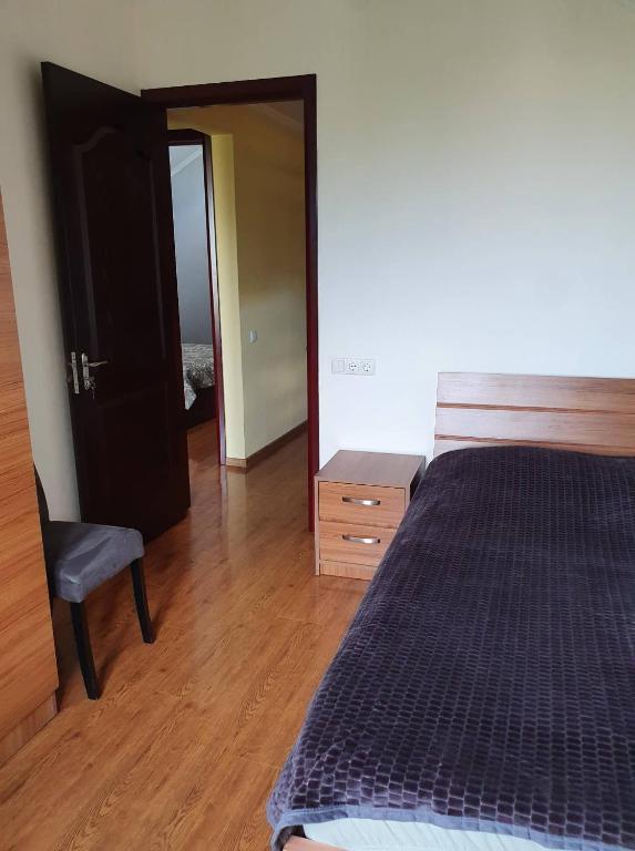 Postel nebo postele na pokoji v ubytování Tbilisi View House