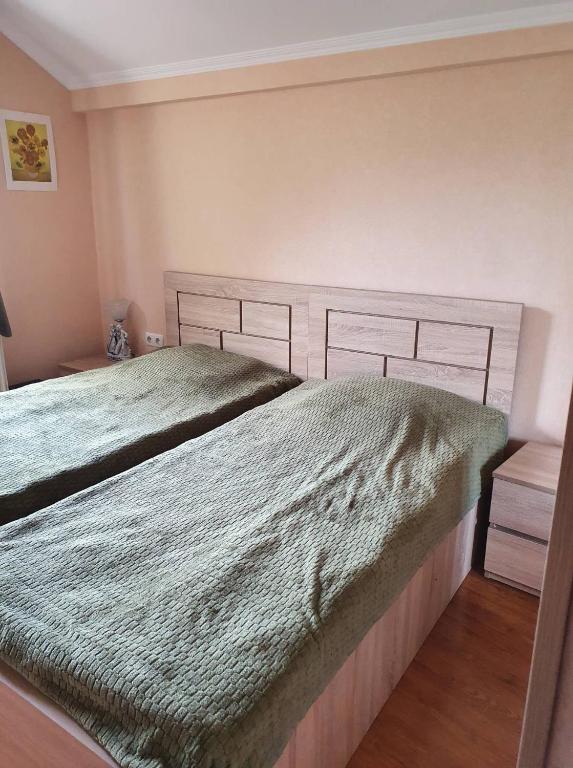 Postel nebo postele na pokoji v ubytování Tbilisi View House