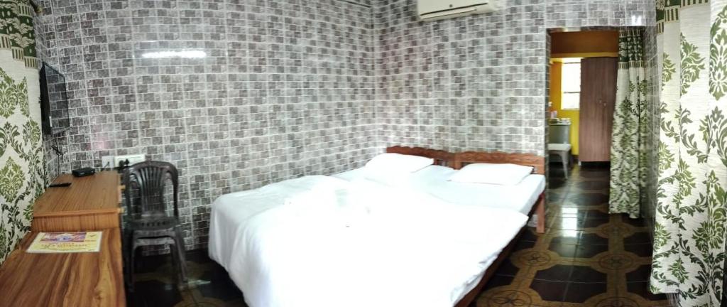 Postel nebo postele na pokoji v ubytování selfia guest house majorda