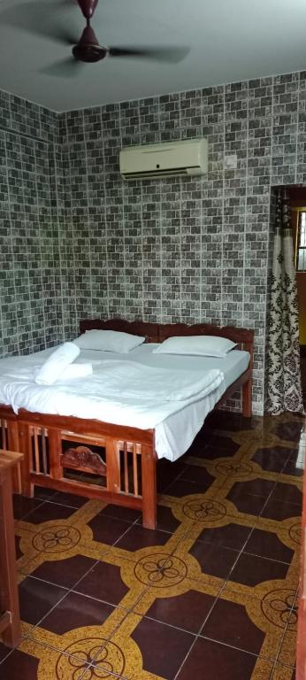 Postel nebo postele na pokoji v ubytování selfia guest house majorda