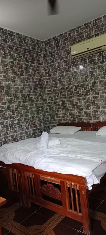Postel nebo postele na pokoji v ubytování selfia guest house majorda