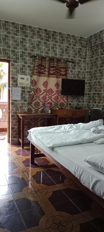 Postel nebo postele na pokoji v ubytování selfia guest house majorda
