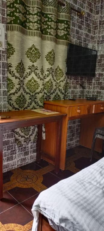 Postel nebo postele na pokoji v ubytování selfia guest house majorda