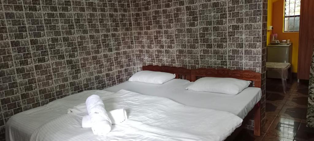 Postel nebo postele na pokoji v ubytování selfia guest house majorda