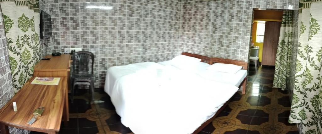 Postel nebo postele na pokoji v ubytování selfia guest house majorda