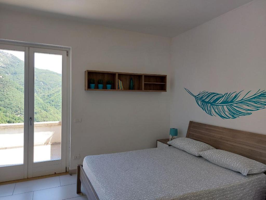 Posteľ alebo postele v izbe v ubytovaní Adagio Ravello
