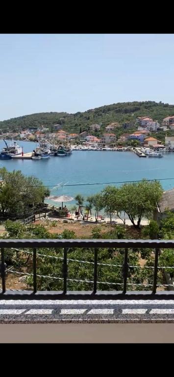 a view of a body of water with boats at Apartmani Mia in Kali