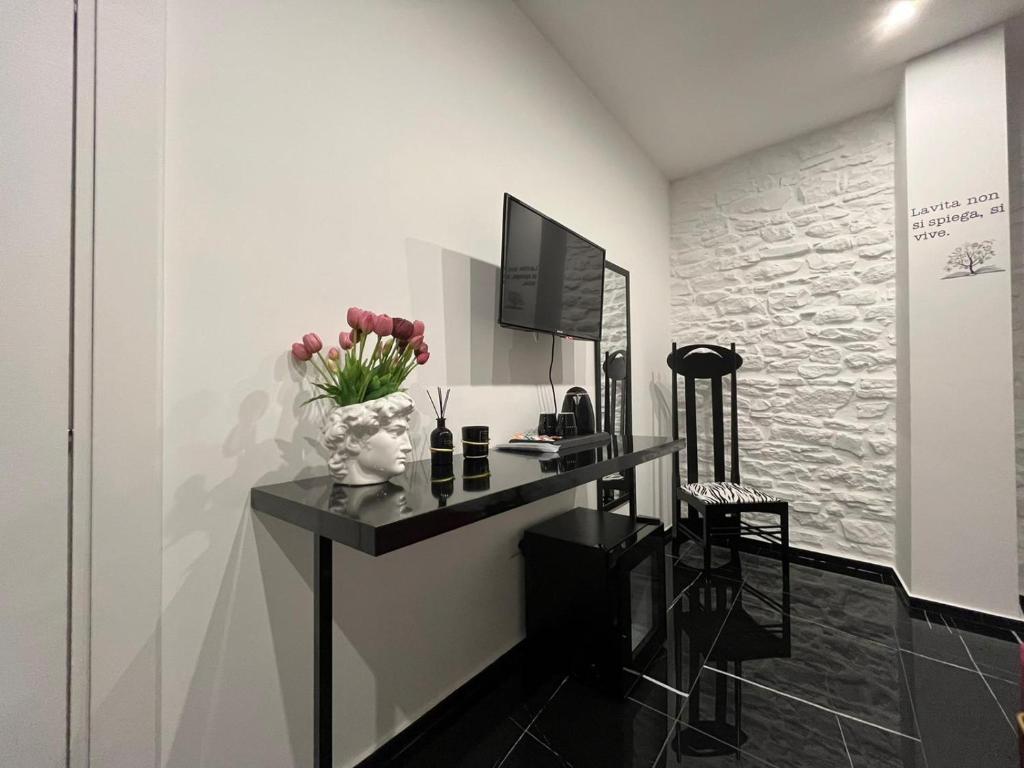 Telewizja i/lub zestaw kina domowego w obiekcie Supriani Luxury B&B