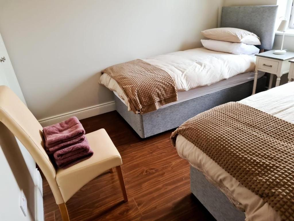 Tempat tidur dalam kamar di Carraroe Apartment 2