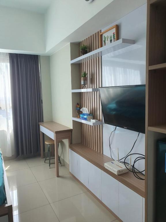 TV a/nebo společenská místnost v ubytování The City Sky Studio MDNPRO APT Springlake SMB