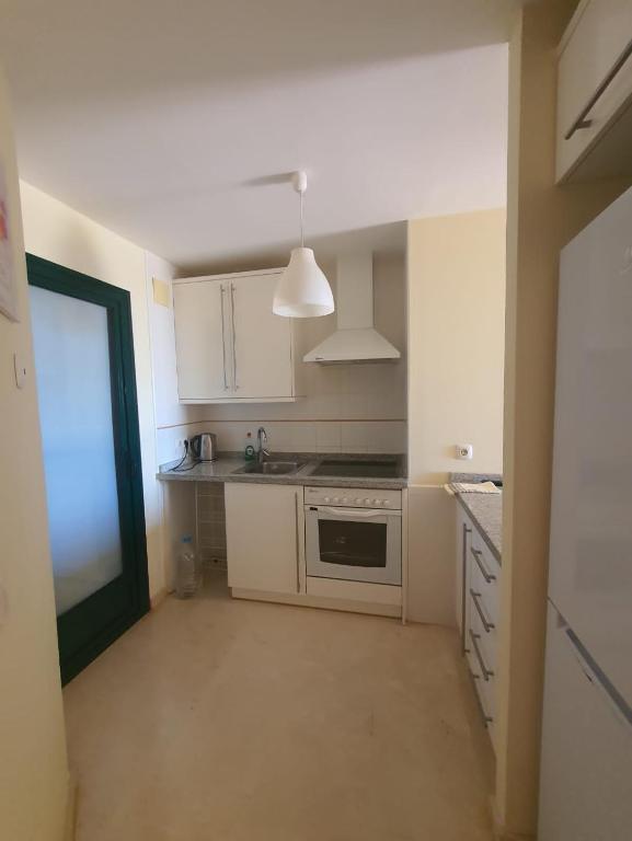 Kuchyň nebo kuchyňský kout v ubytování Luxyry apartament Benidorm