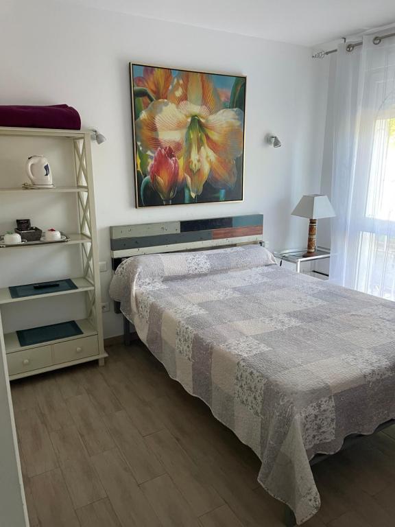 Postel nebo postele na pokoji v ubytování L'Abribis
