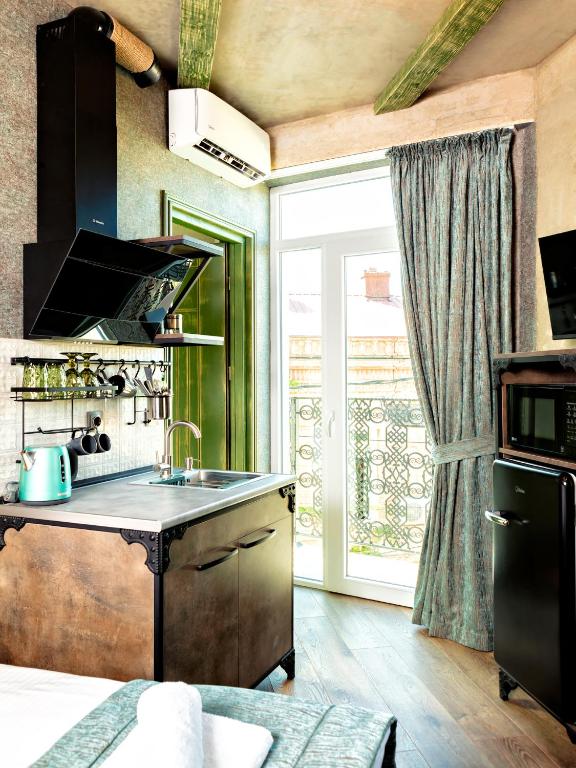 Kuchyň nebo kuchyňský kout v ubytování 6 Unique Apartments
