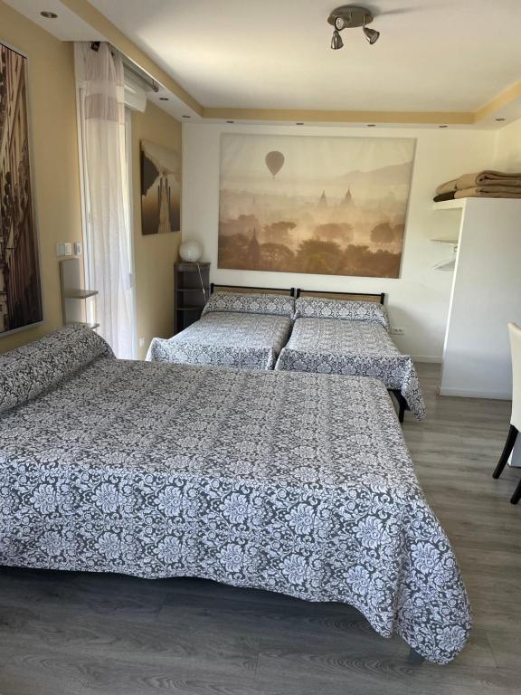 Postel nebo postele na pokoji v ubytování L'Abribis