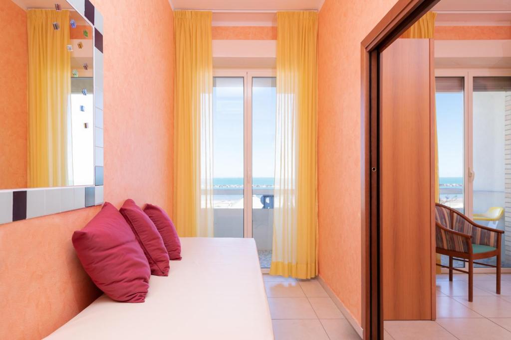 Postel nebo postele na pokoji v ubytování Hotel Caesar