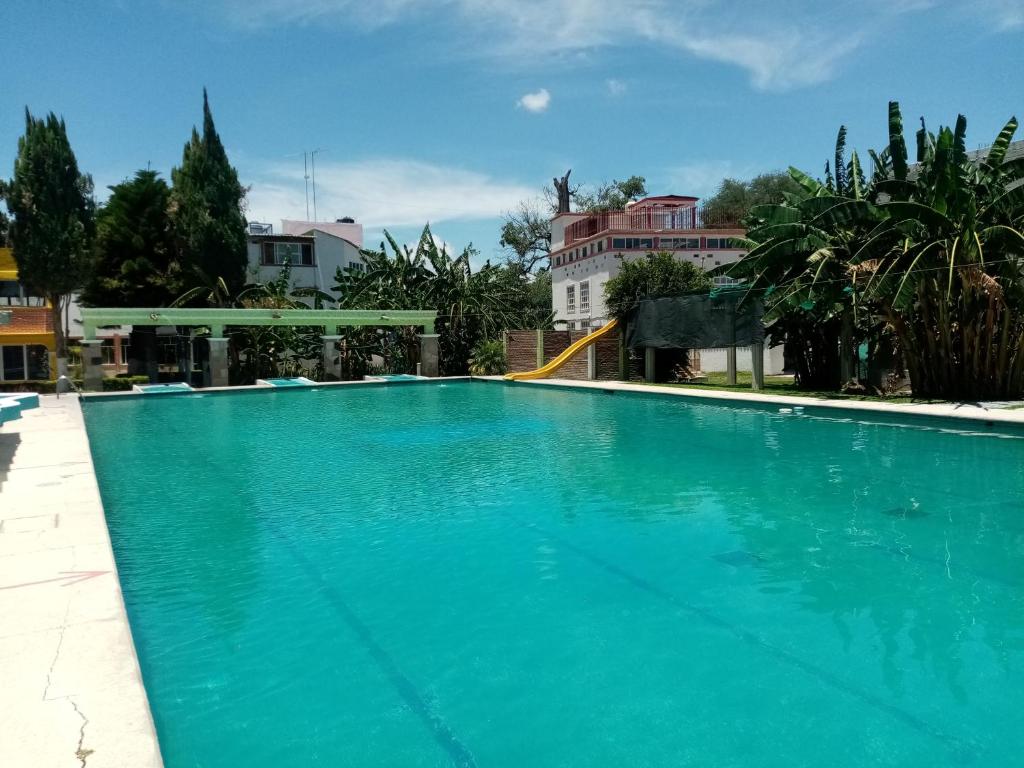 Bazén v ubytování Hotel Cipreses nebo v jeho okolí