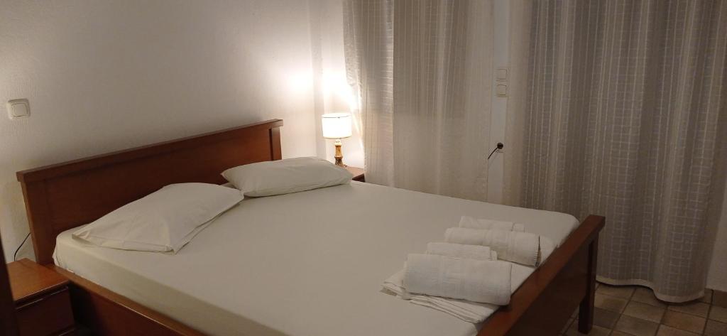 Posteľ alebo postele v izbe v ubytovaní Raptis Aparthotel Sivota