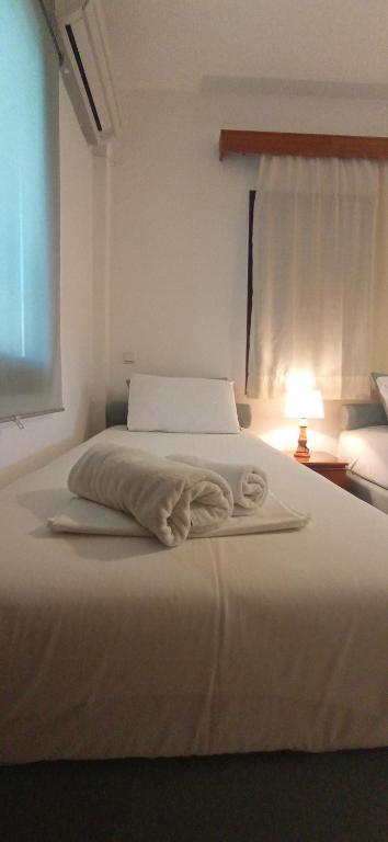 Posteľ alebo postele v izbe v ubytovaní Raptis Aparthotel Sivota