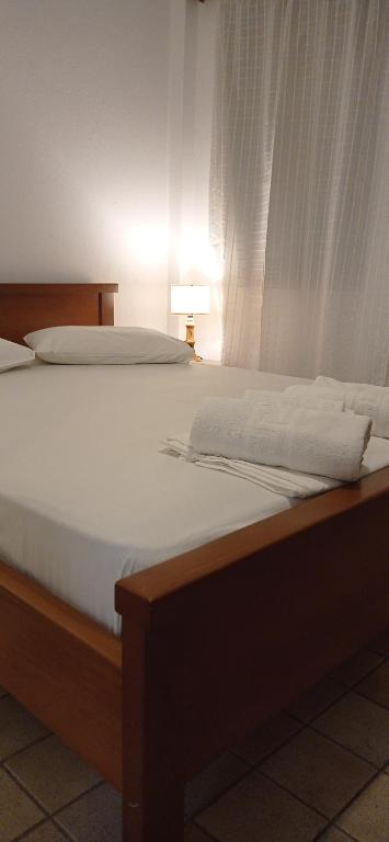 Posteľ alebo postele v izbe v ubytovaní Raptis Aparthotel Sivota