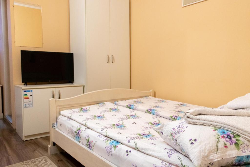 Postel nebo postele na pokoji v ubytování Hotel Tranzit