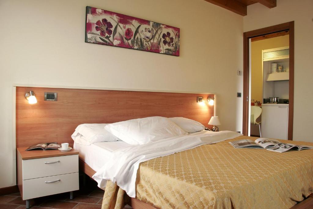 Postel nebo postele na pokoji v ubytování Bed&Wine