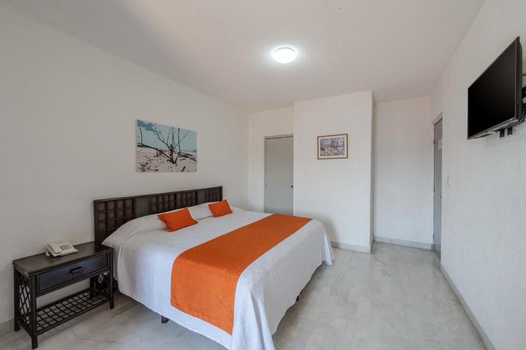 Postel nebo postele na pokoji v ubytování Hotel Imperial Laguna Faranda Cancún
