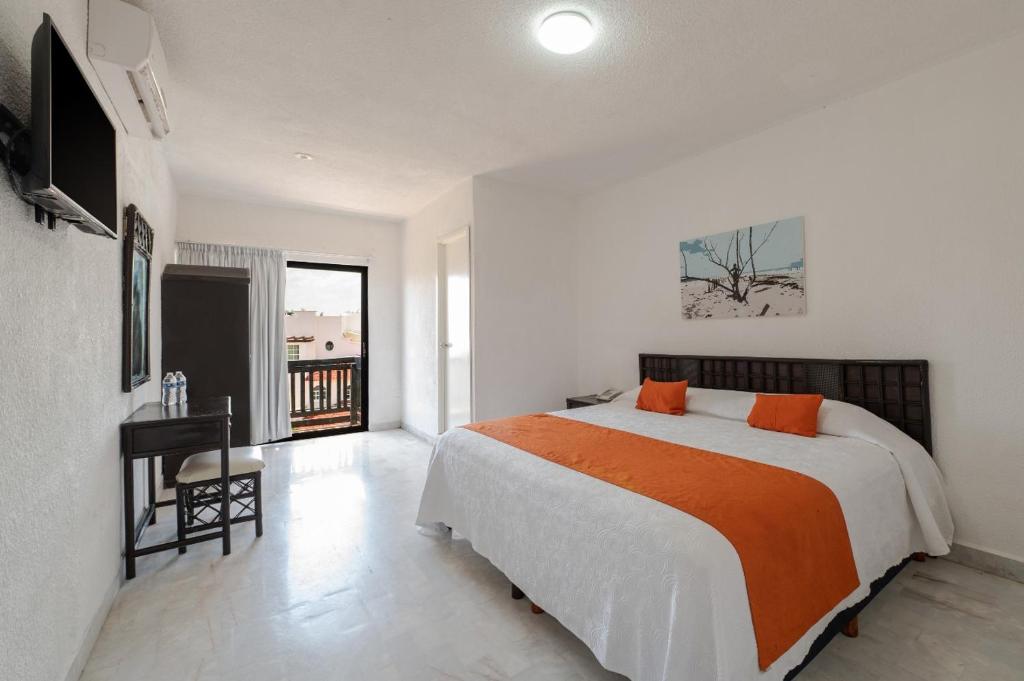 Postel nebo postele na pokoji v ubytování Hotel Imperial Laguna Faranda Cancún