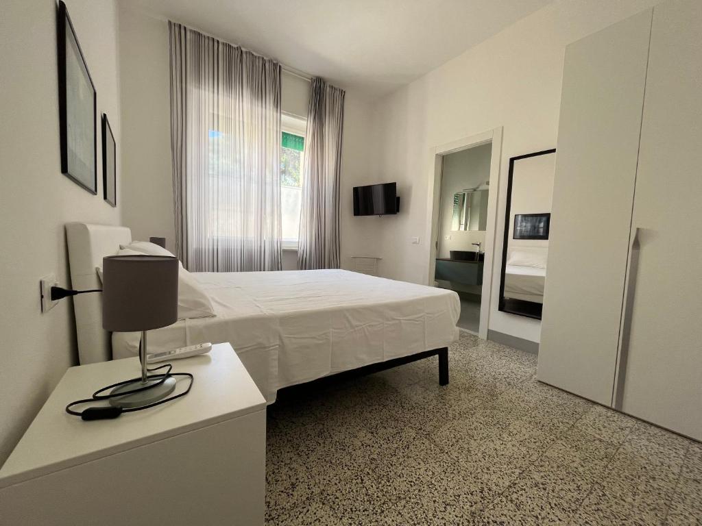 Postel nebo postele na pokoji v ubytování Bed and coffee Rooms Portoferraio