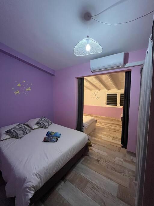 Una cama o camas en una habitaci&oacute;n de La villa Kazacosy