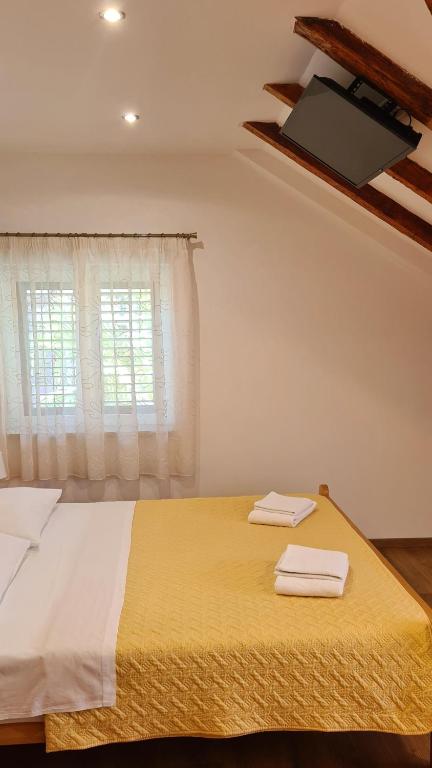 Posteľ alebo postele v izbe v ubytovaní Attic Split apartment near city centre