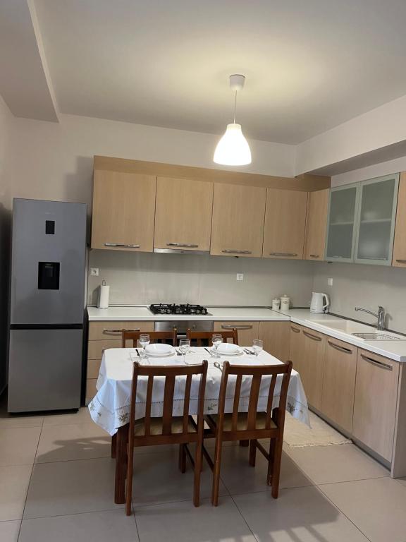 Kuchyň nebo kuchyňský kout v ubytování Porto Rafti Holiday Apartment