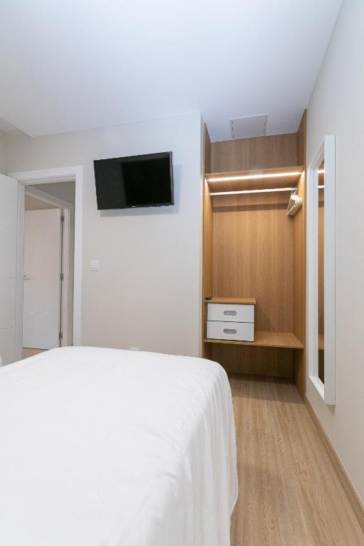 Postel nebo postele na pokoji v ubytování Palacios 30, Playa Nanín