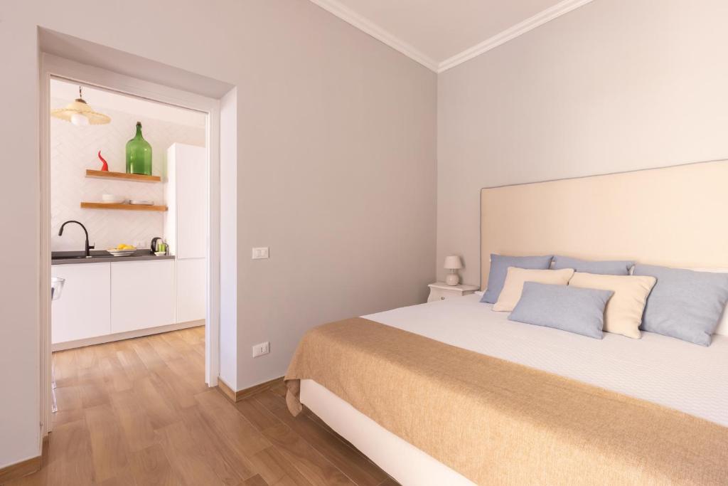 Łóżko lub łóżka w pokoju w obiekcie 4711 Boutique Apartment