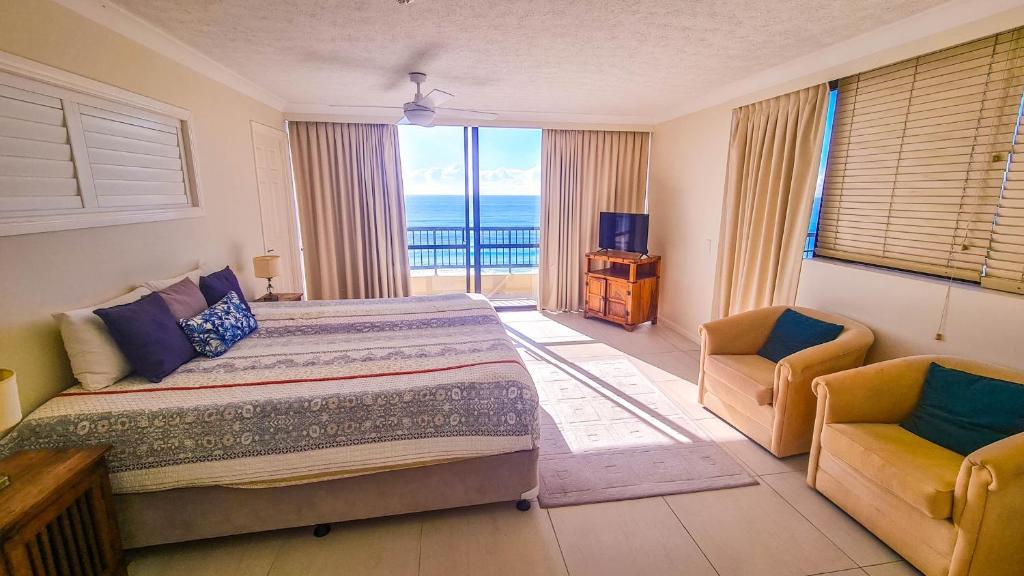 Postel nebo postele na pokoji v ubytování Pelican Sands Beach Resort