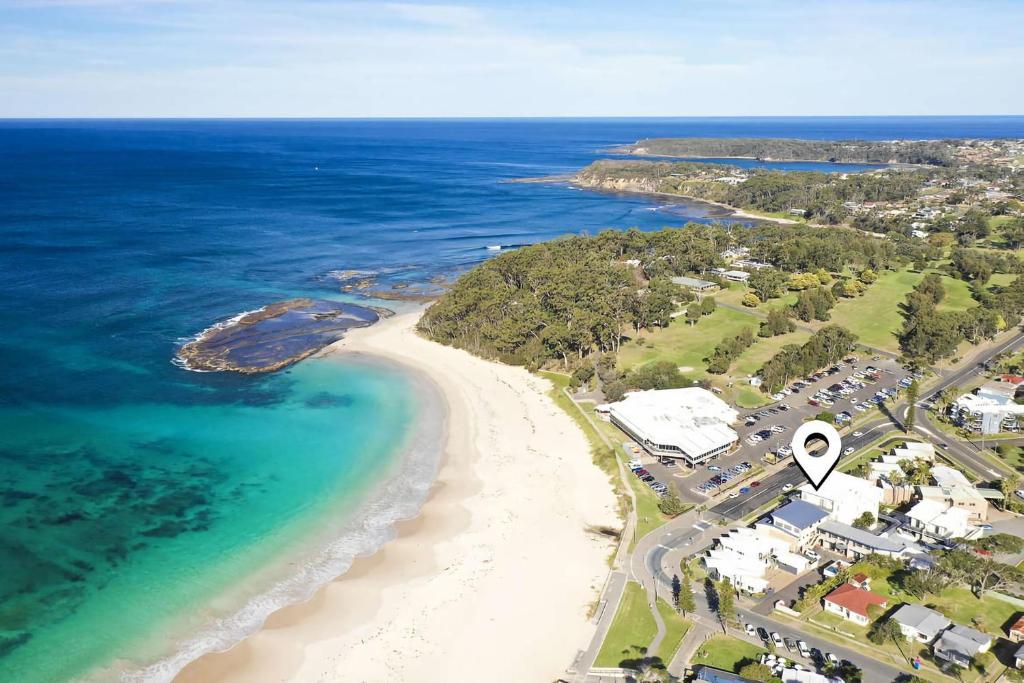 an aerial view of a beach and the ocean at Beachfront 2 in Mollymook