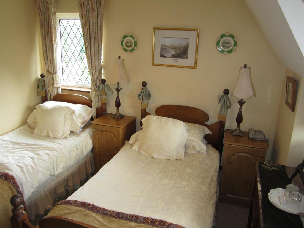 Postel nebo postele na pokoji v ubytování Killyon Guest House