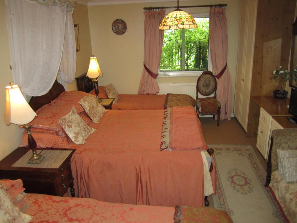 Postel nebo postele na pokoji v ubytování Killyon Guest House