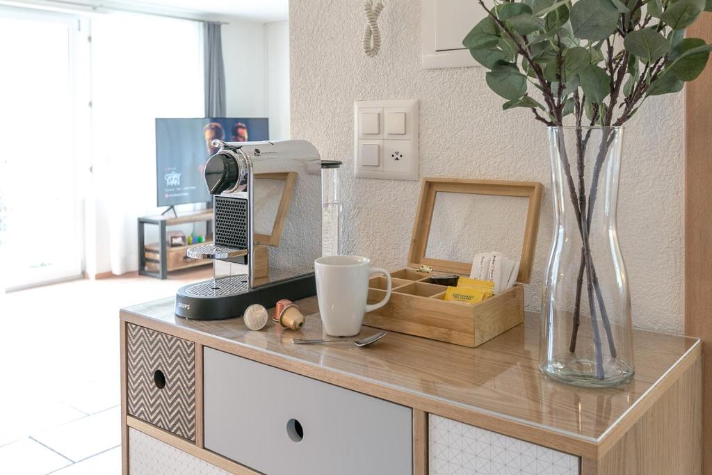 Kuchyň nebo kuchyňský kout v ubytování Spirit Apartments - Balkon mit Seesicht - Parkplatz